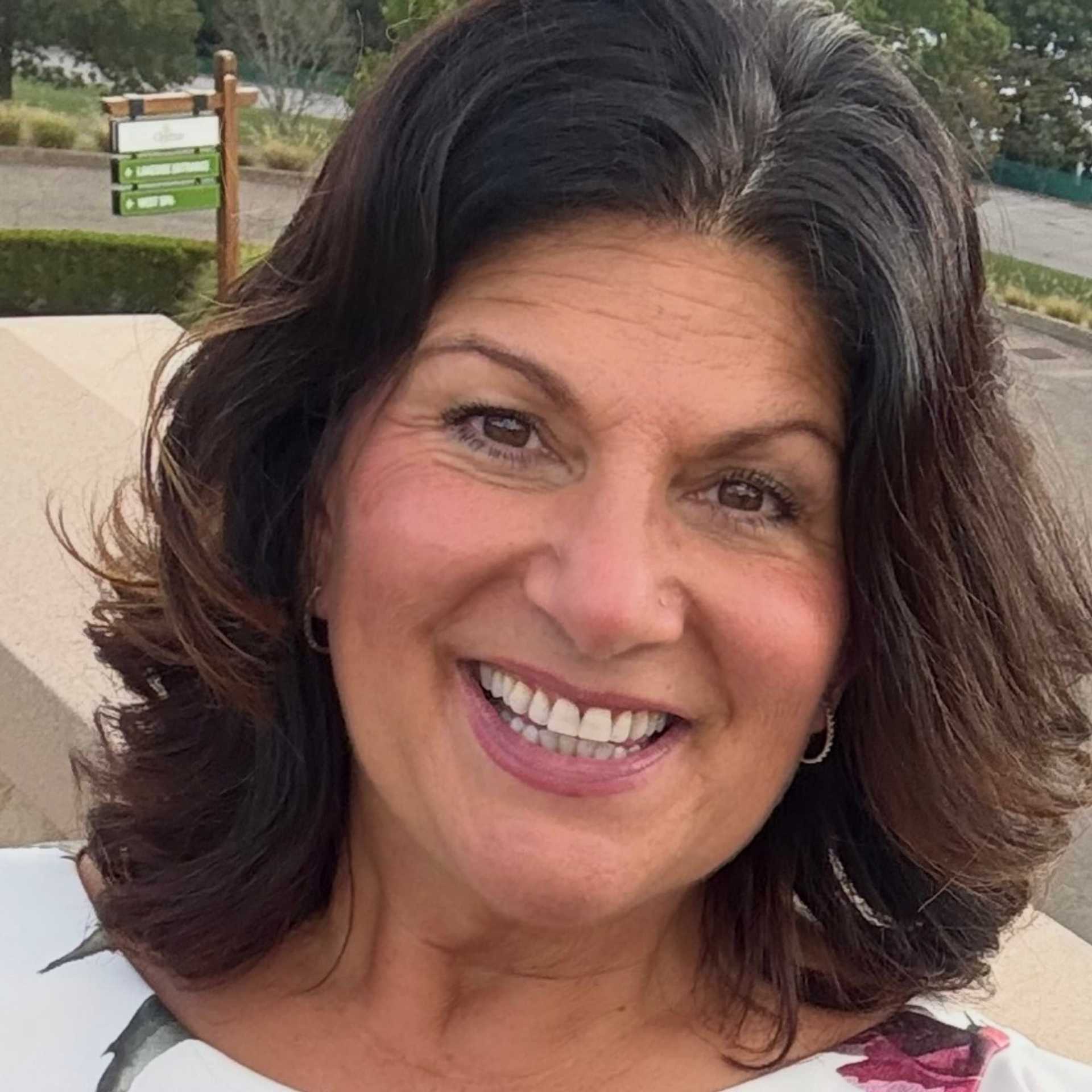 Portrait of Marie Bradberry, a professional stylist at Snoballs Salon, showcasing their expertise and style.