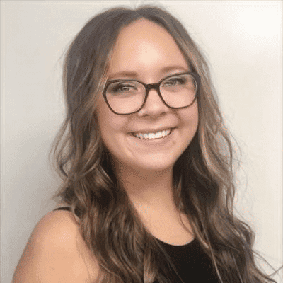 Portrait of Kelsey Beresh, a professional stylist at Snoballs Salon, showcasing their expertise and style.