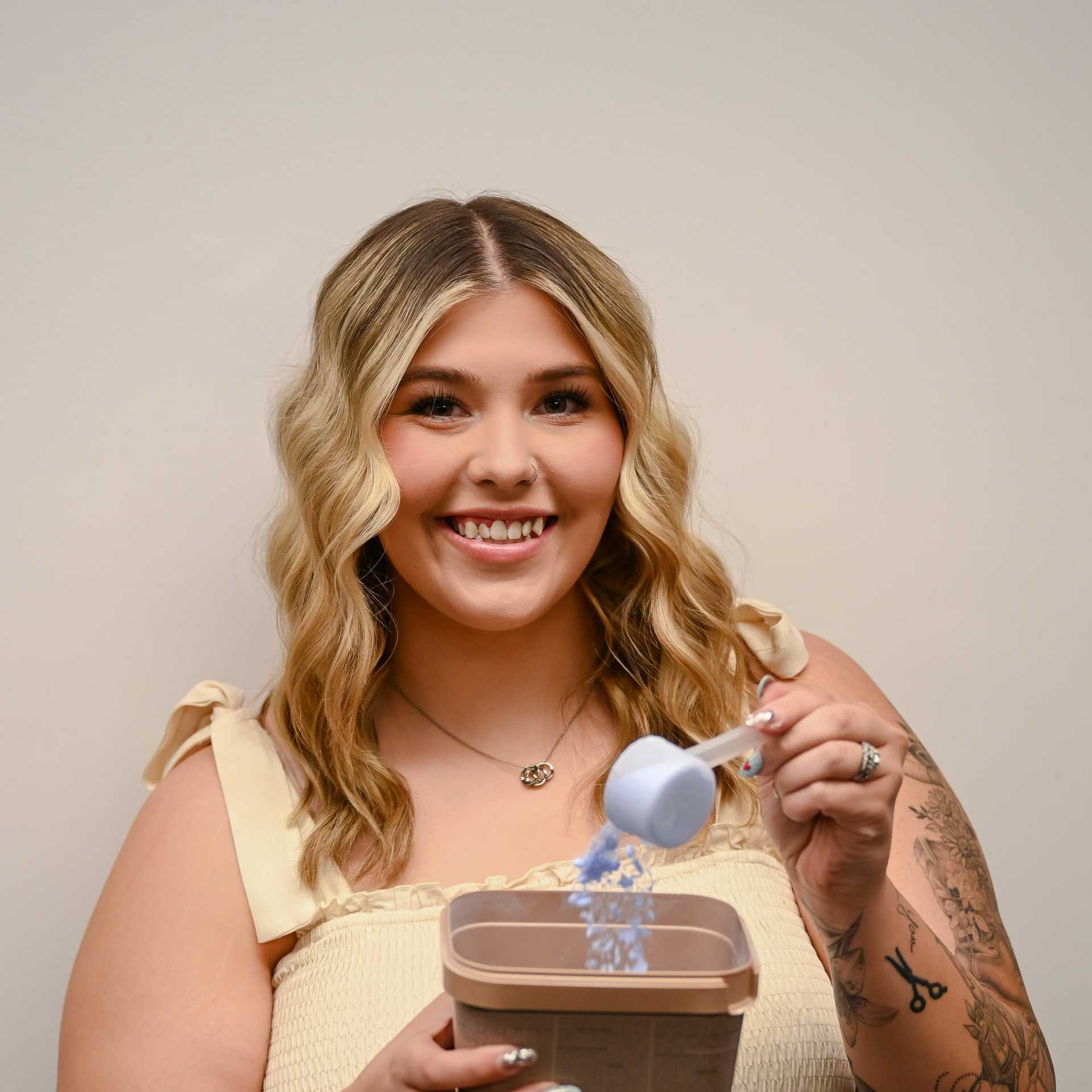 Portrait of Allie Keller, a professional stylist at Snoballs Salon, showcasing their expertise and style.
