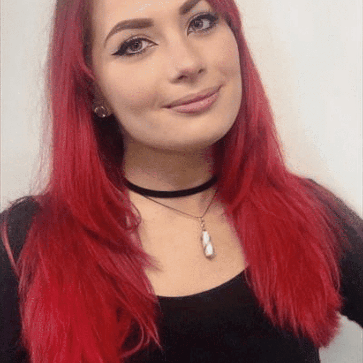 Portrait of Marlyn Kostelac, a professional stylist at Snoballs Salon, showcasing their expertise and style.