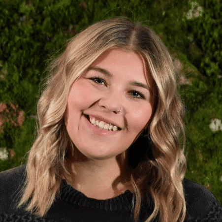 Portrait of Allie Keller, a professional stylist at Snoballs Salon, showcasing their expertise and style.