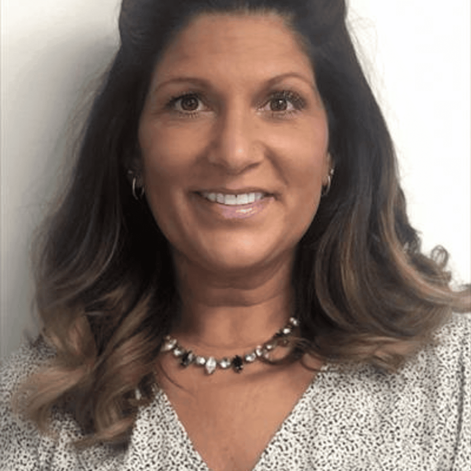 Portrait of Marie Bradberry, a professional stylist at Snoballs Salon, showcasing their expertise and style.